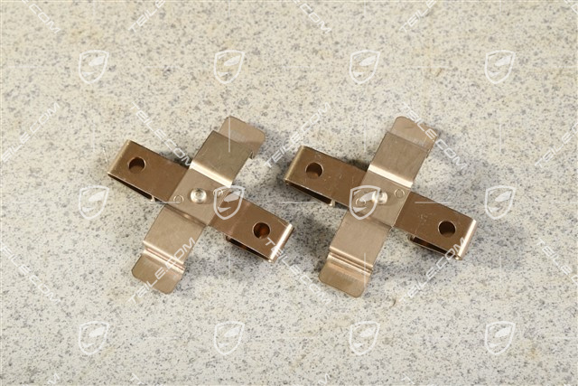 Front axle fixed caliper spring, brake pad mouting