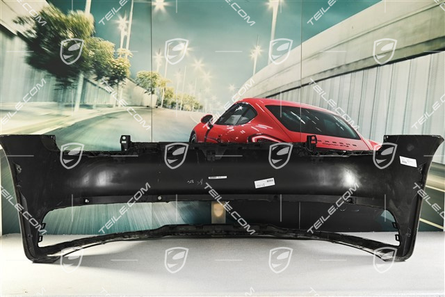 Rear bumper with ParkAssist and reversing camera holes, sports exhaust